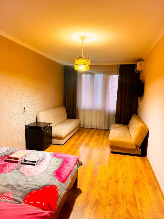 Llit o llits en una habitació de Rustaveli Apartment