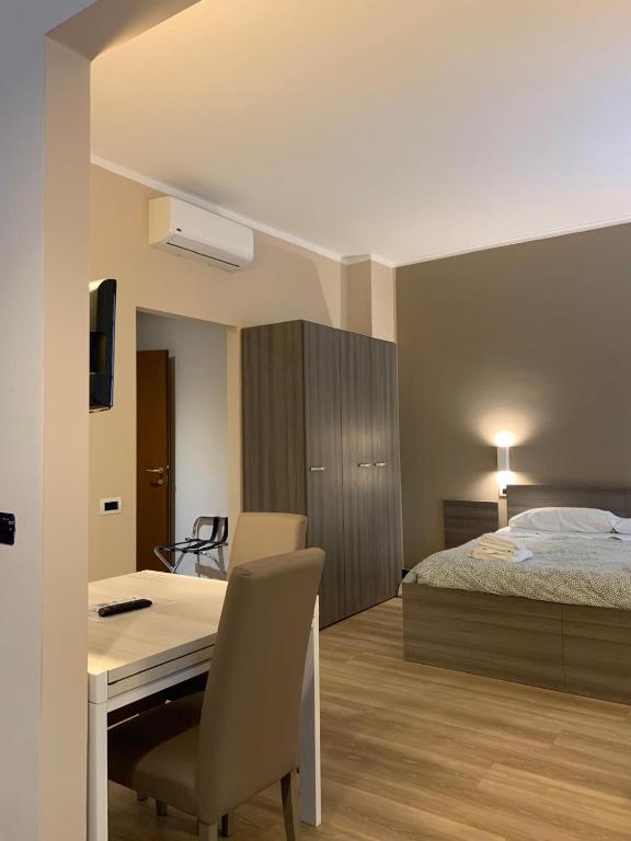 Postel nebo postele na pokoji v ubytování ALBERGO LOCANDA DIANA