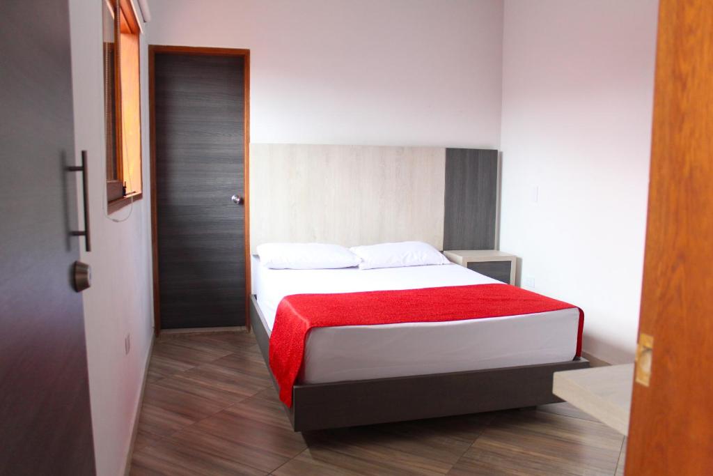 Postel nebo postele na pokoji v ubytování Hotel La Bastida