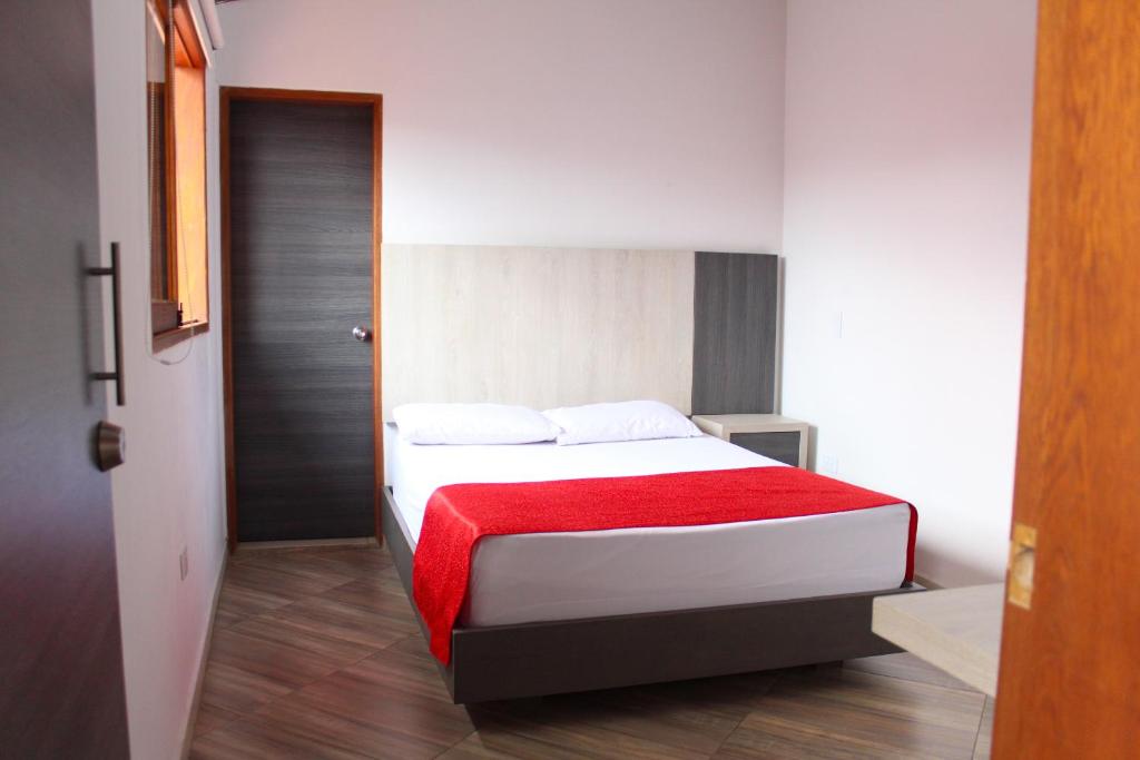 Postel nebo postele na pokoji v ubytování Hotel La Bastida