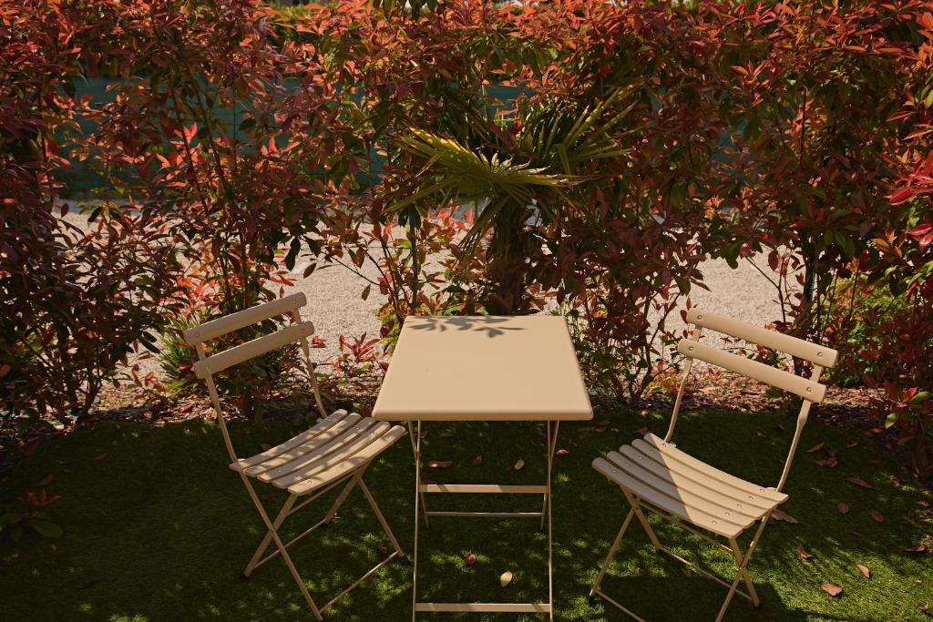 Een tuin van Hotel Le Mura