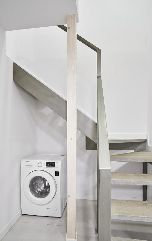 Cama o camas de una habitación en Loft duplex - by Wehomes