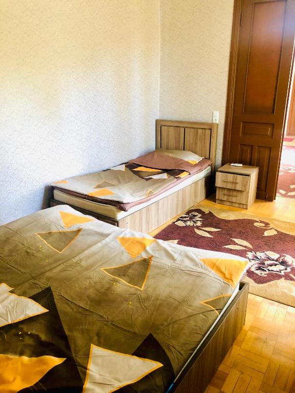 Postel nebo postele na pokoji v ubytování Guest House Coffee