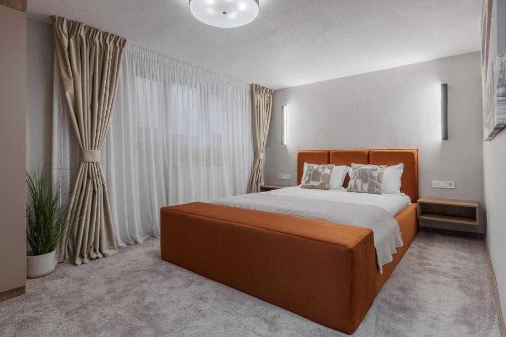 Postel nebo postele na pokoji v ubytování Oasis Rooms