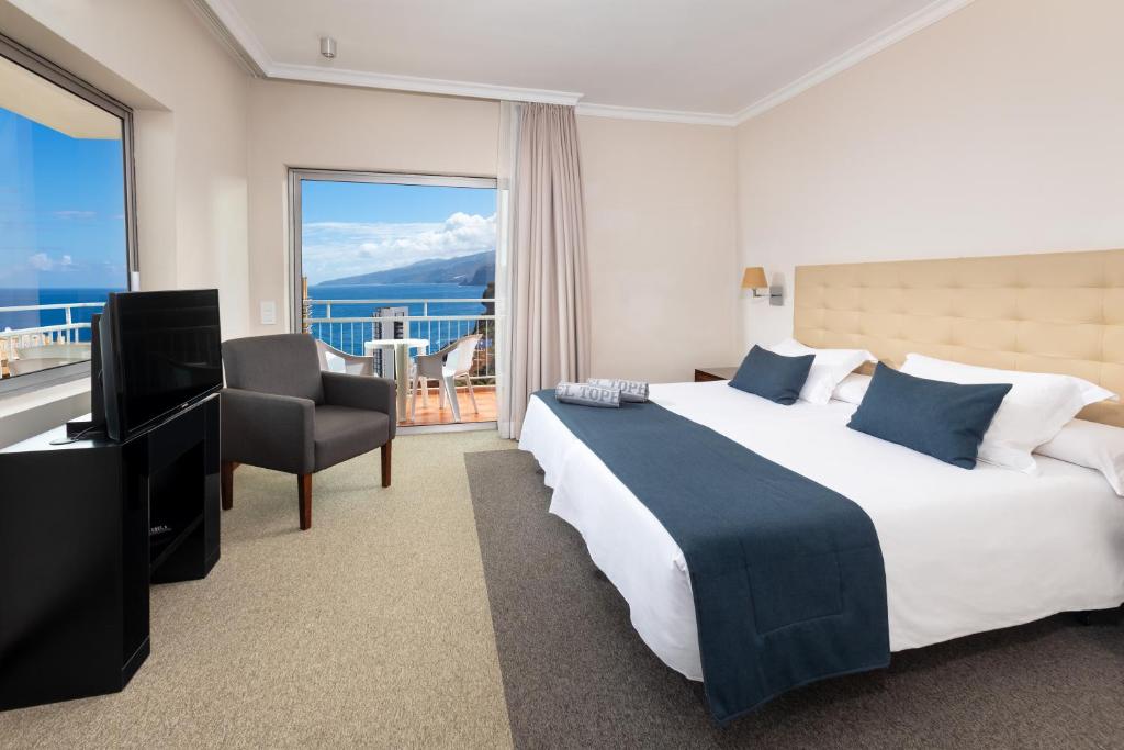 Postel nebo postele na pokoji v ubytování Hotel Atlantic El Tope