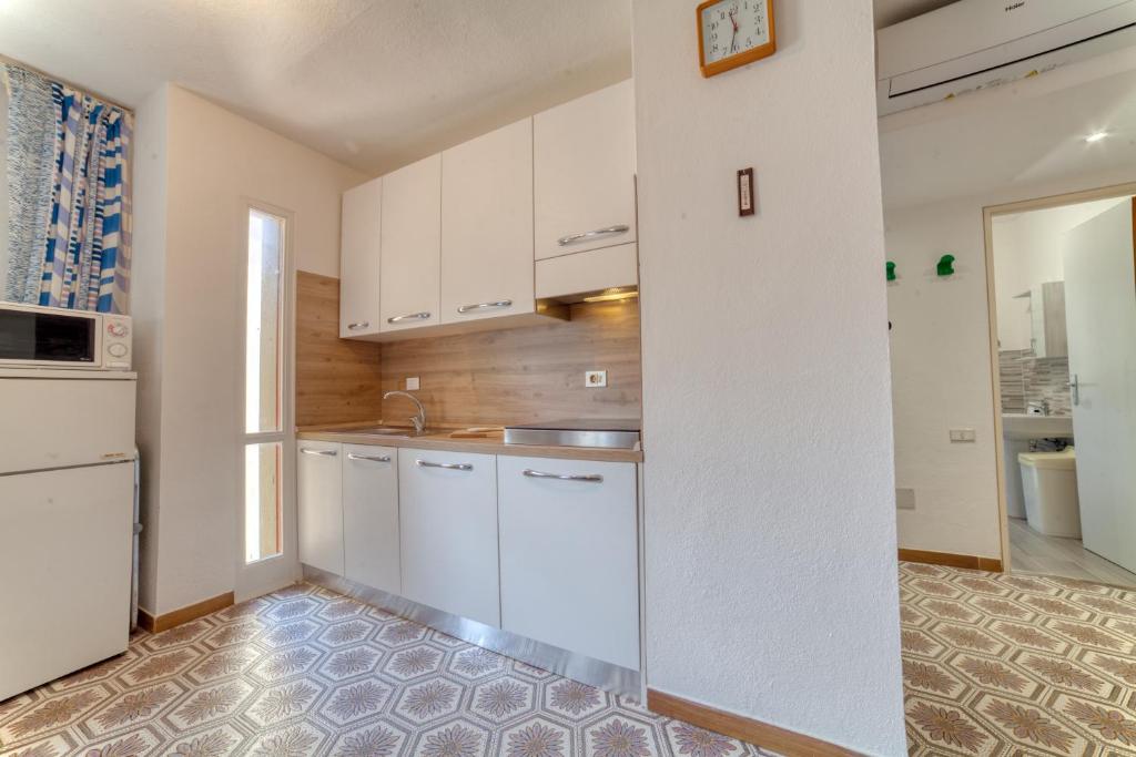 Dapur atau dapur kecil di Nerida Apartment