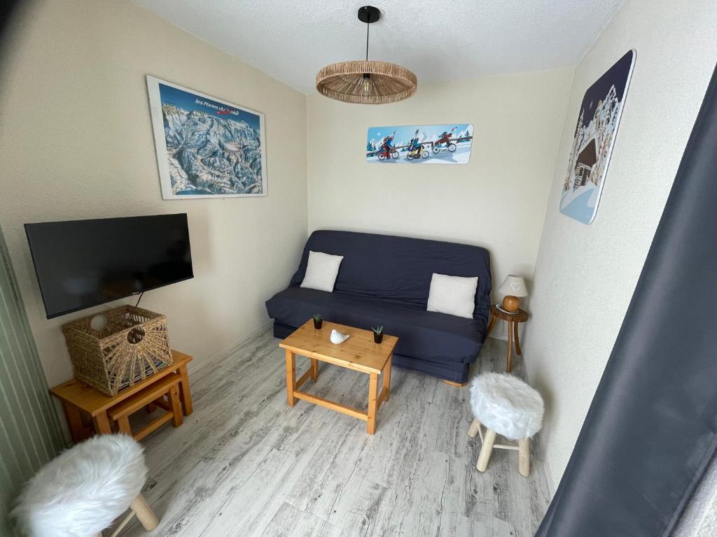 TV a/nebo společenská místnost v ubytování Appartement terrasse avec vue exceptionnelle