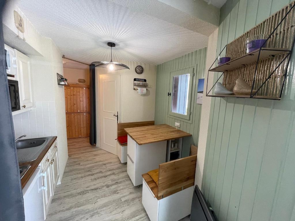 Kuchyň nebo kuchyňský kout v ubytování Appartement terrasse avec vue exceptionnelle