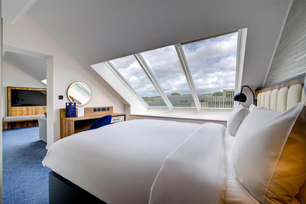 Postel nebo postele na pokoji v ubytování Radisson Blu Hotel, Durham