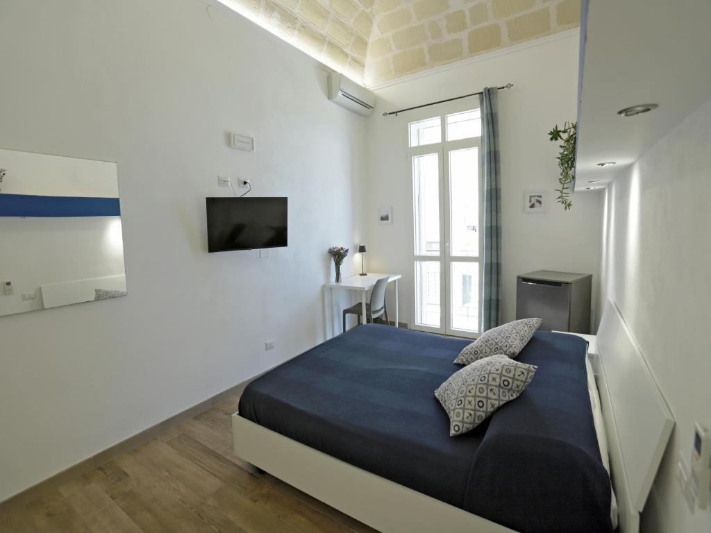 Posteľ alebo postele v izbe v ubytovaní Sea View Teti Rooms & Apts