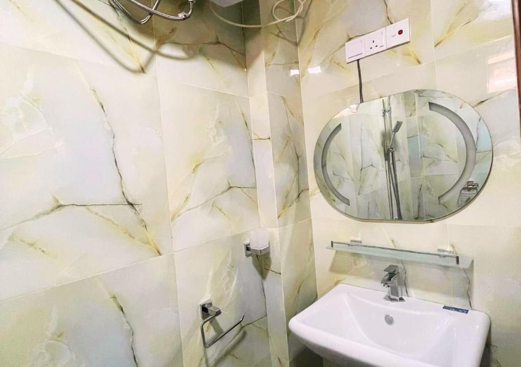 Koupelna v ubytování Sandakada Homestay