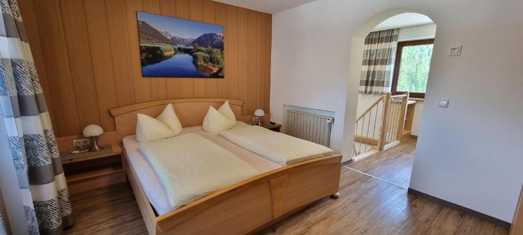 Postel nebo postele na pokoji v ubytování Haus Kirchmaier