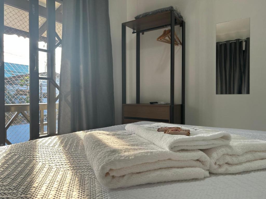 Ένα ή περισσότερα κρεβάτια σε δωμάτιο στο Apartamento no Costa e silva