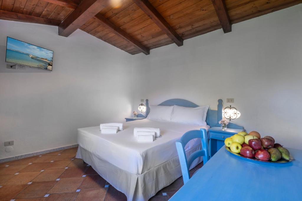 Postel nebo postele na pokoji v ubytování AHR Altura Hotel Porto Rafael