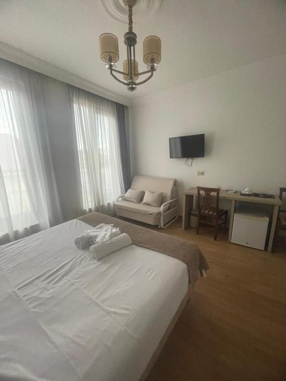 Postel nebo postele na pokoji v ubytování Hotel Varios