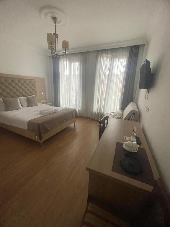 Postel nebo postele na pokoji v ubytování Hotel Varios