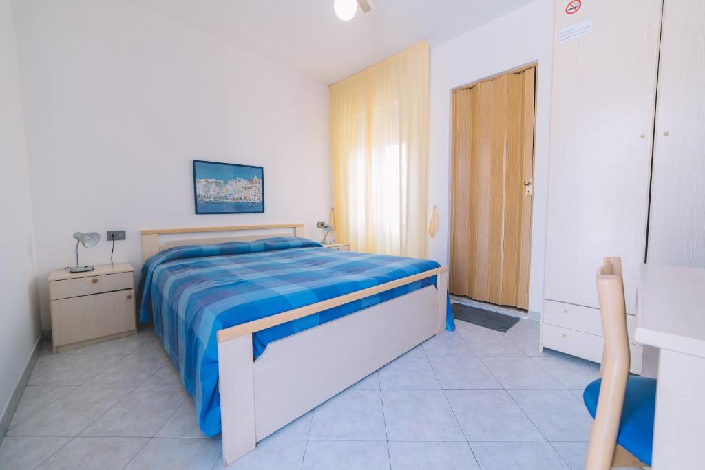 Postel nebo postele na pokoji v ubytování Hotel Edera