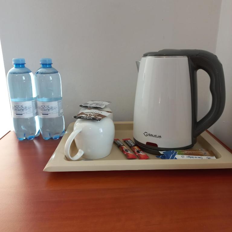 Příslušenství pro přípravu čaje a kávy v ubytování Akwen
