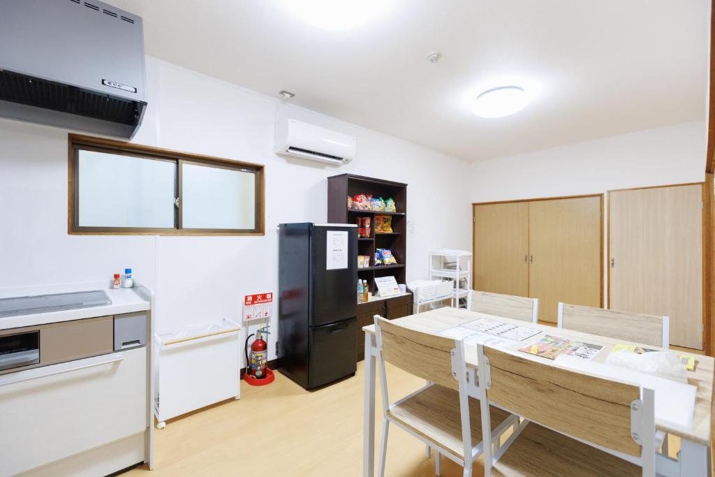 Kuchyň nebo kuchyňský kout v ubytování Guesthouse Fukufuku