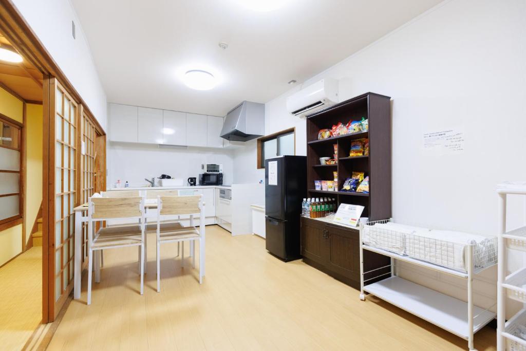 Kuchyň nebo kuchyňský kout v ubytování Guesthouse Fukufuku