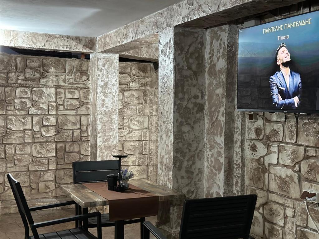 TV a/nebo společenská místnost v ubytování Хотел Елисей