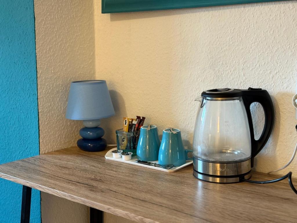 Příslušenství pro přípravu čaje a kávy v ubytování City View Apartment - WiFi - Netflix - Airport Shuttle