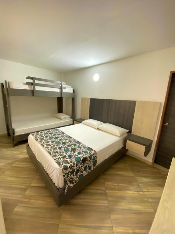 Postel nebo postele na pokoji v ubytování Hotel La Bastida