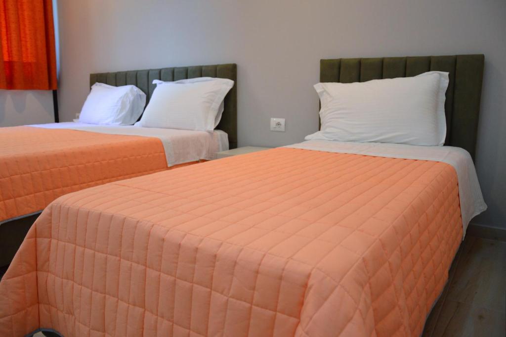 Postel nebo postele na pokoji v ubytování Hotel Beler