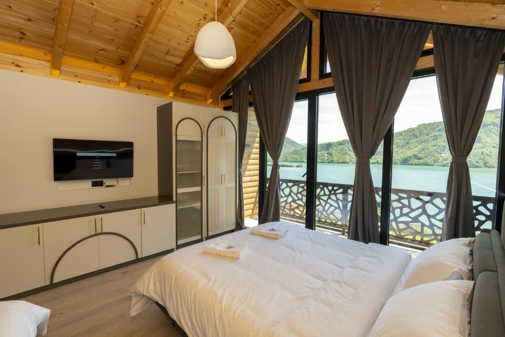 Postel nebo postele na pokoji v ubytování Hotel 5 Stinet