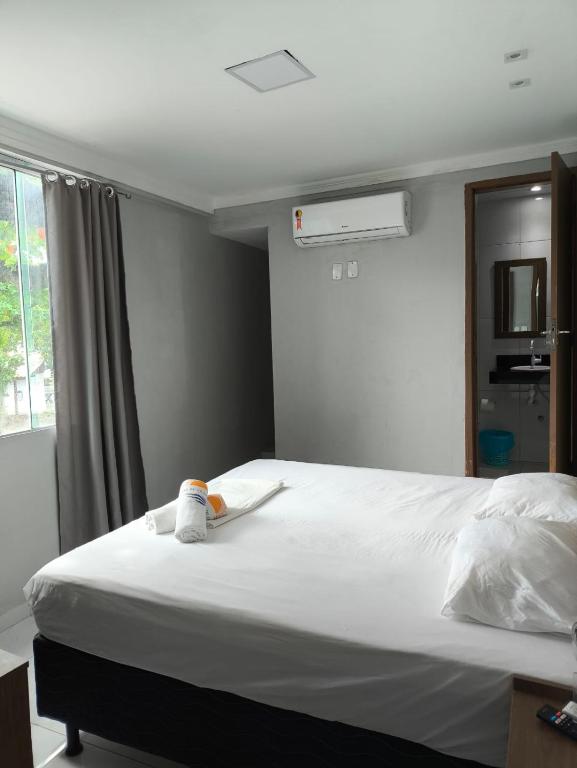 Postel nebo postele na pokoji v ubytování Hotel Luar de Itapua