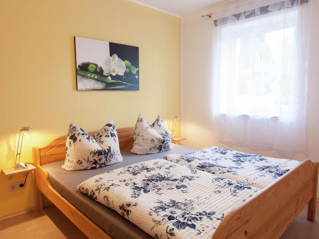 Postel nebo postele na pokoji v ubytování Cosy Apartment in Weißig with Garden