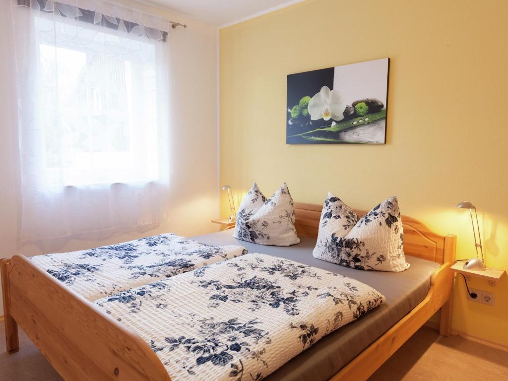 Postel nebo postele na pokoji v ubytování Cosy Apartment in Weißig with Garden