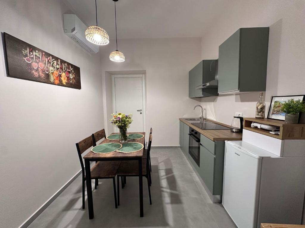 Kuchyň nebo kuchyňský kout v ubytování Casa di Priam