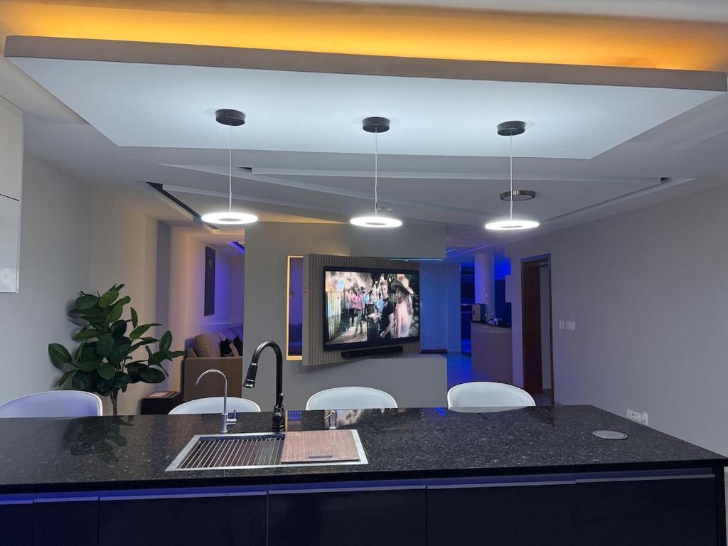 TV a/nebo společenská místnost v ubytování N3XT-LEVEL Home