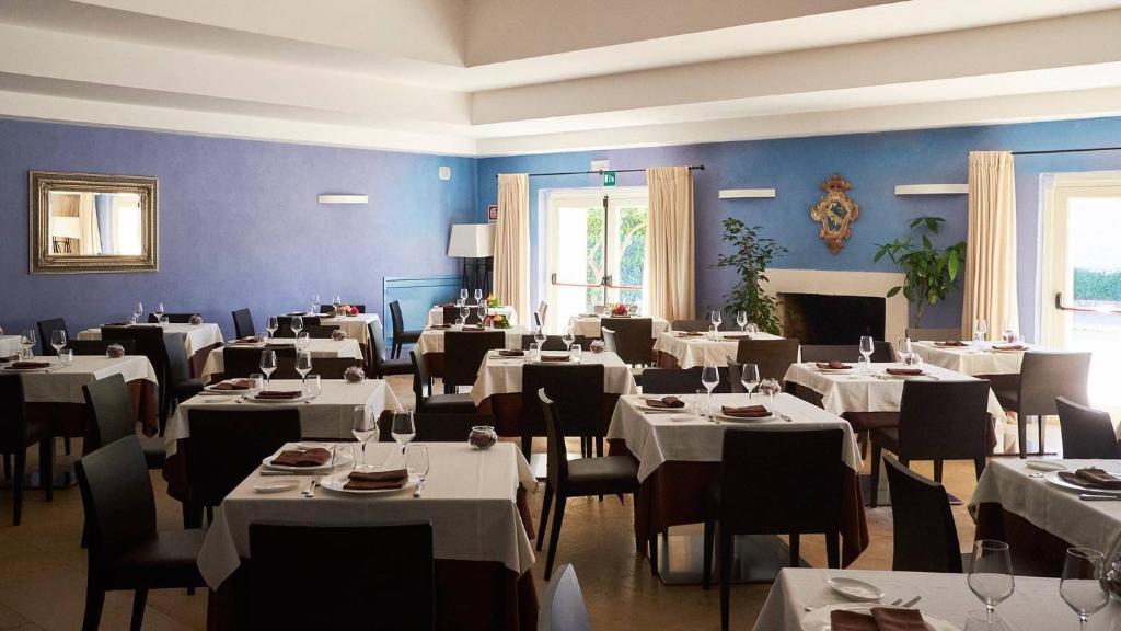 Televízia a/alebo spoločenská miestnosť v ubytovaní Dolce by Wyndham Siracusa - I Monasteri Golf & Spa