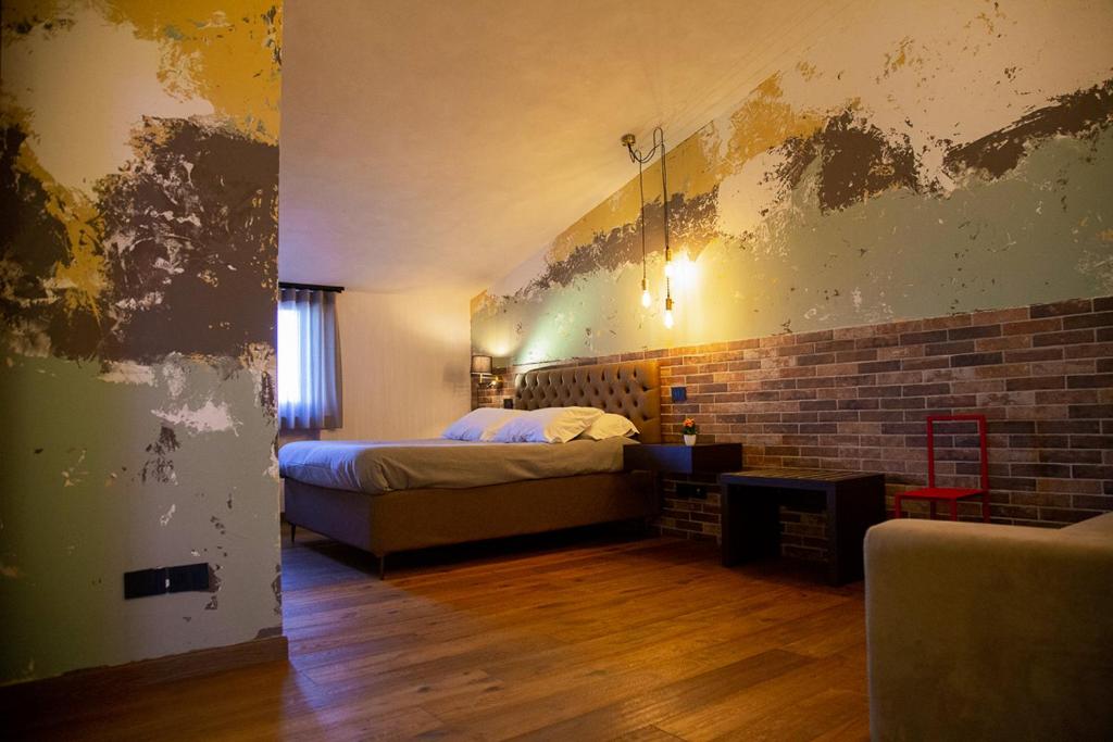 Posteľ alebo postele v izbe v ubytovaní MANTRA Suite&Rooms