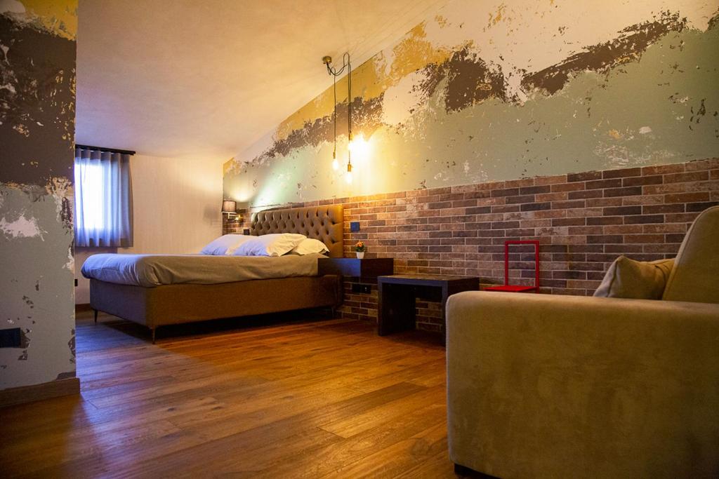 Posteľ alebo postele v izbe v ubytovaní MANTRA Suite&Rooms