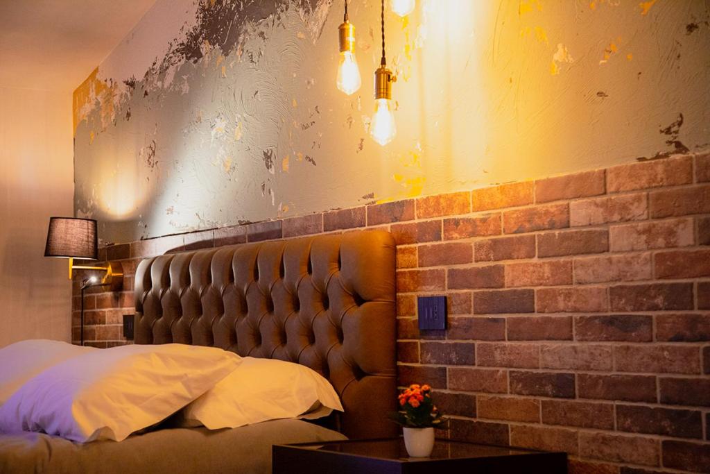 Posteľ alebo postele v izbe v ubytovaní MANTRA Suite&Rooms