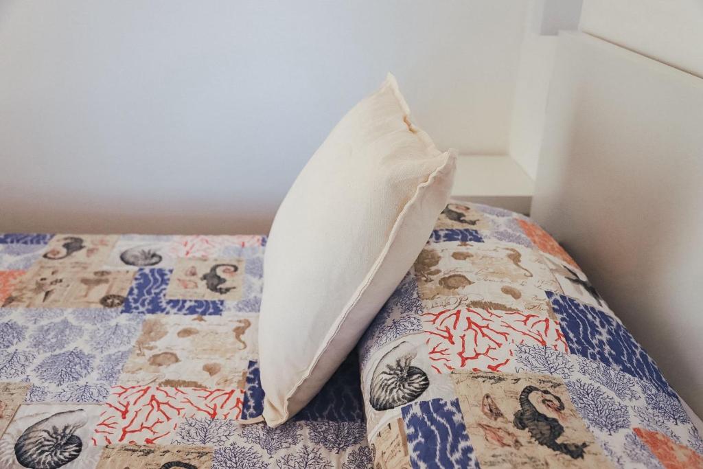 Postel nebo postele na pokoji v ubytování Conte Cavour B&B
