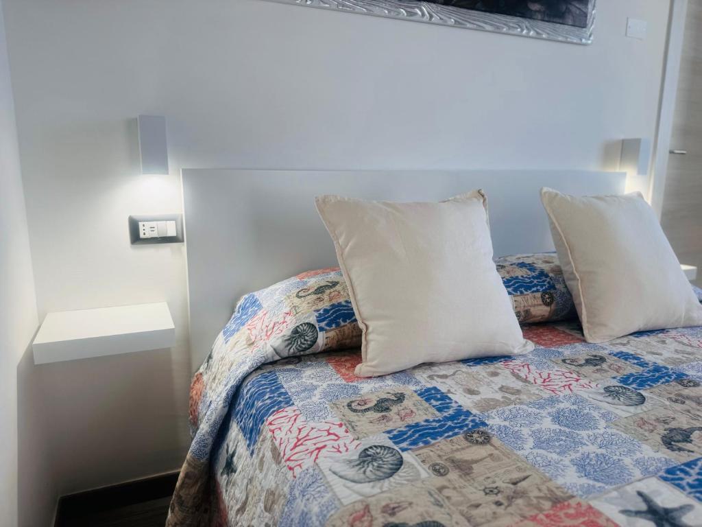 Postel nebo postele na pokoji v ubytování Conte Cavour B&B