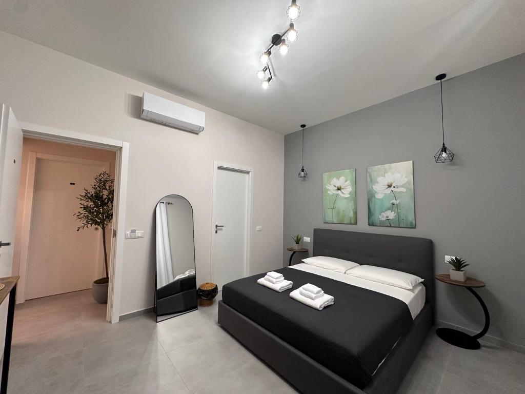 Postel nebo postele na pokoji v ubytování Casa di Priam