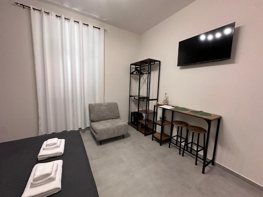 TV a/nebo společenská místnost v ubytování Casa di Priam