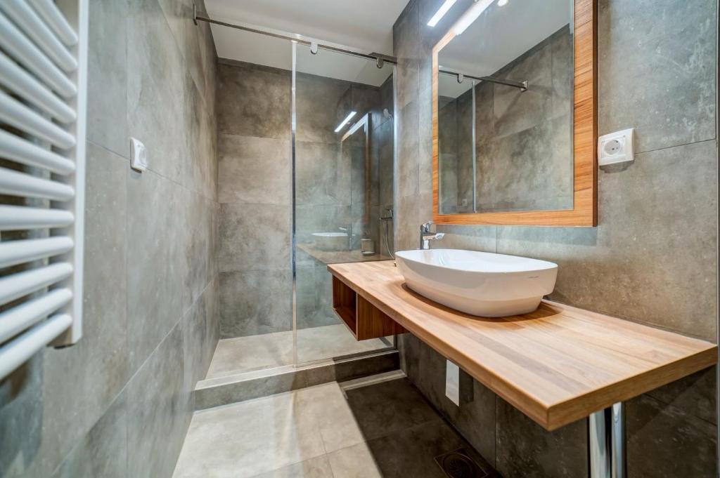 Koupelna v ubytování Kalman SPA&GYM