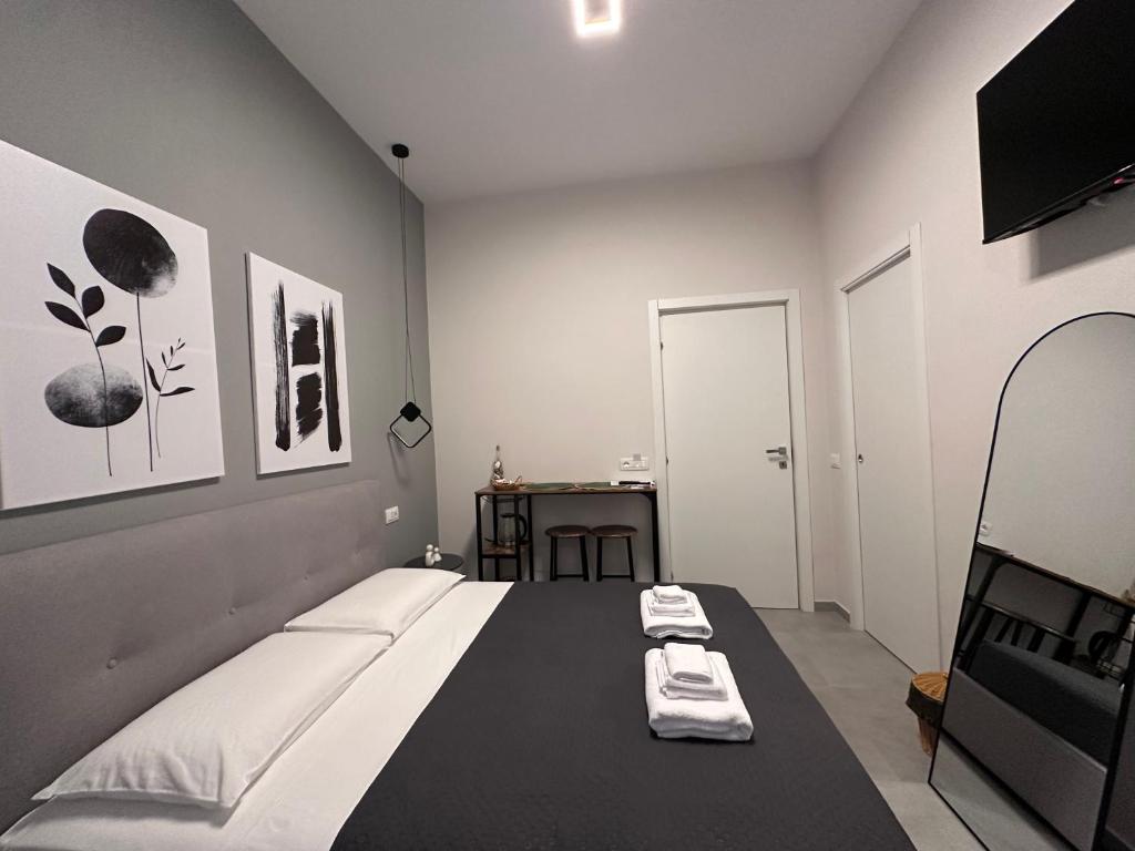 Postel nebo postele na pokoji v ubytování Casa di Priam