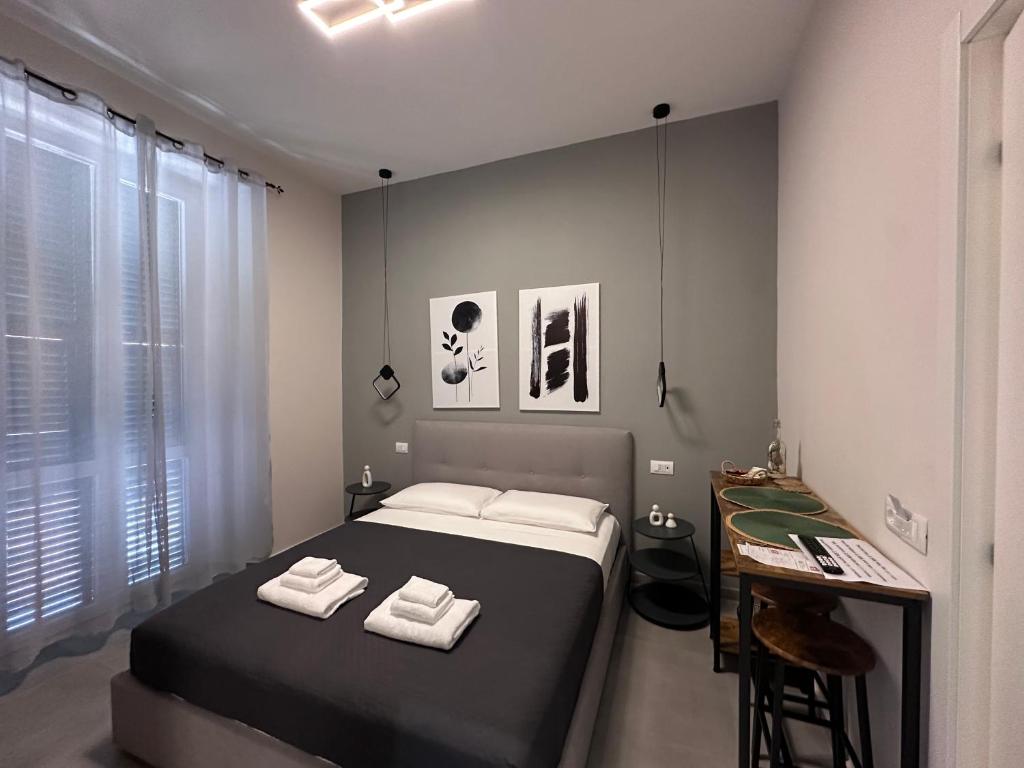 Postel nebo postele na pokoji v ubytování Casa di Priam