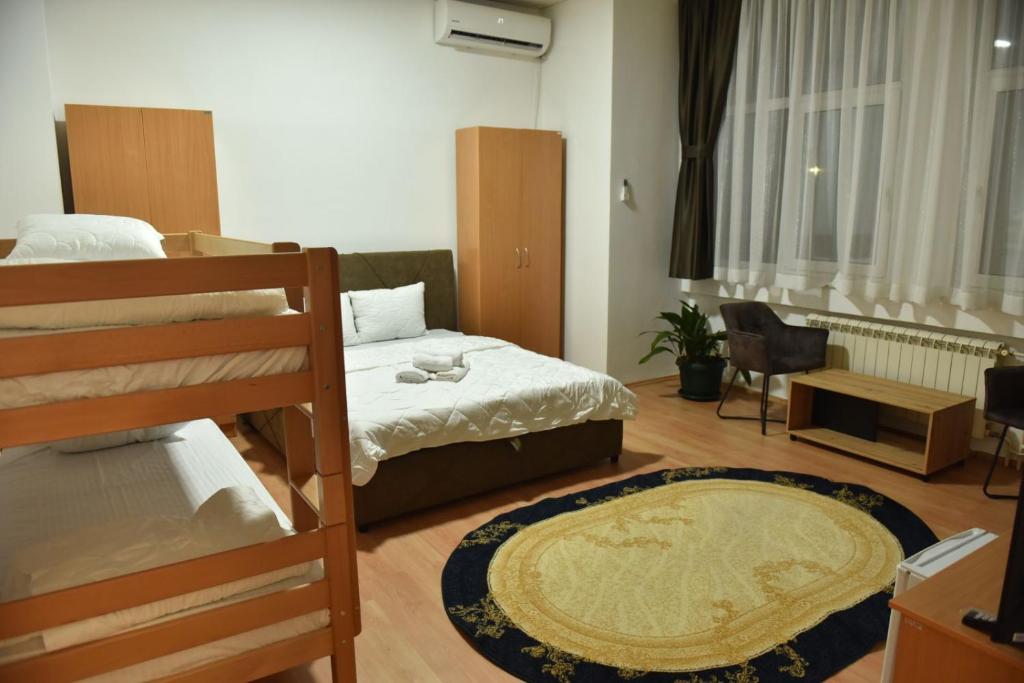 Postel nebo postele na pokoji v ubytování Peron