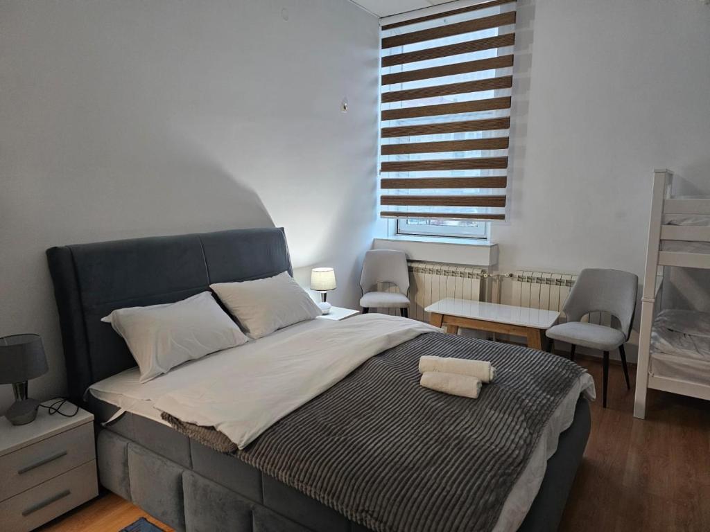 Postel nebo postele na pokoji v ubytování Peron