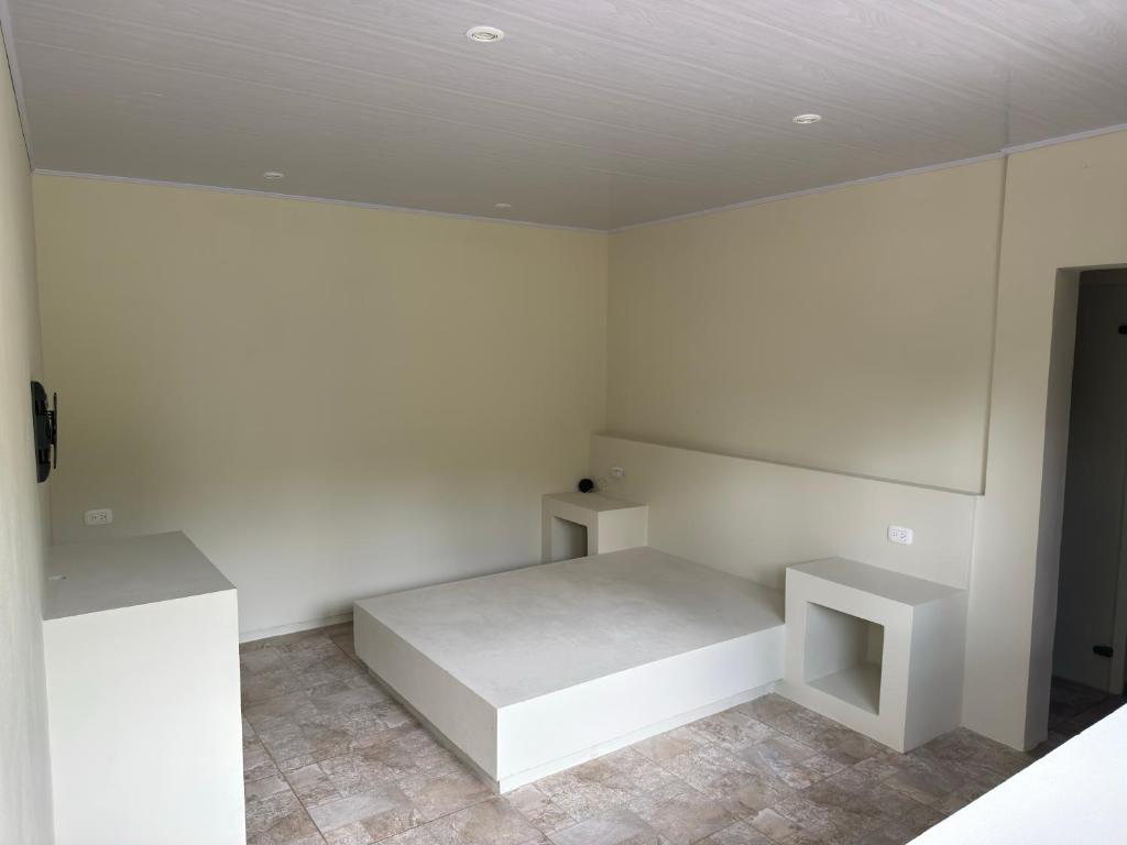 Postel nebo postele na pokoji v ubytování Jaragual EcoHostel