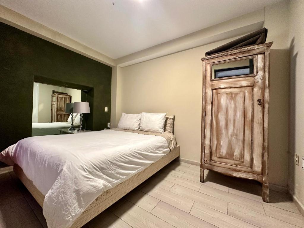 Postel nebo postele na pokoji v ubytování Casa Bakora Hotel