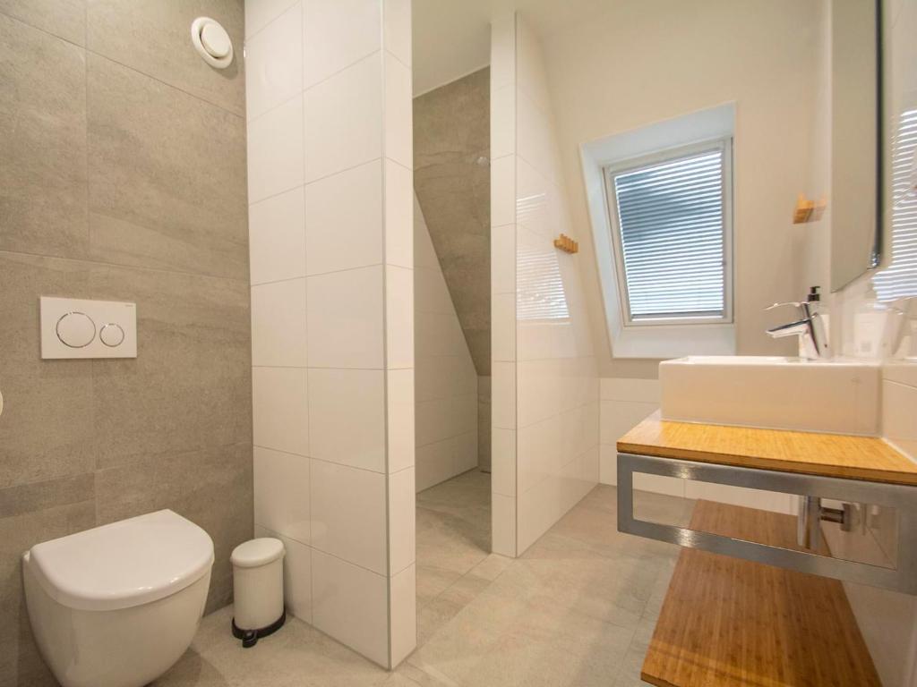 Koupelna v ubytování Luxury holiday home by seaside and dunes